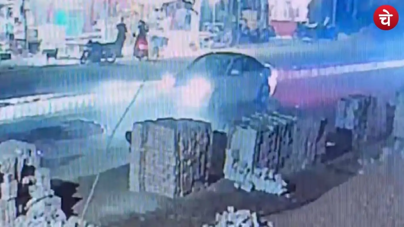 An Audi car hits a motorcycle in Aligarh